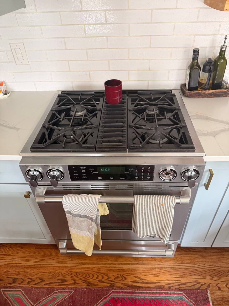 Stainless steel gas range in a residential kitchen